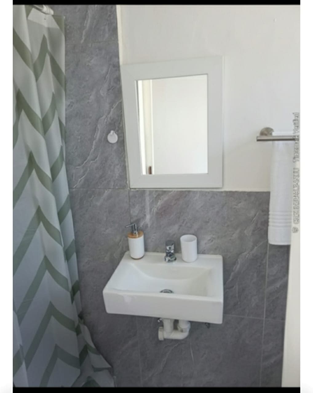 Modern ensuite bathroom guesthouse Bellville South - gray marble tiles, white fixtures and shower